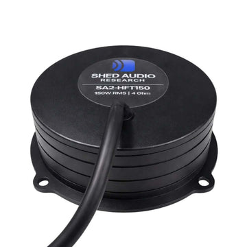 Shed Audio SA2-HFT150 tactile transducer top view, showcasing 150W RMS and 4 Ohm specifications.